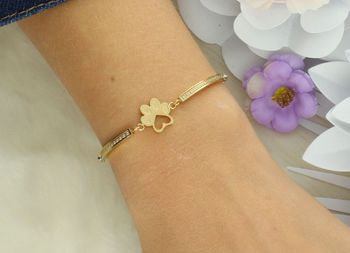 Odkryj bransoletkę Nomination Milleluci z unikalnym złotym odciskiem łapy (28018014). Elegancka biżuteria ze stali szlachetnej i złota – idealna na prezent dla miłośników zwierząt!.jpg